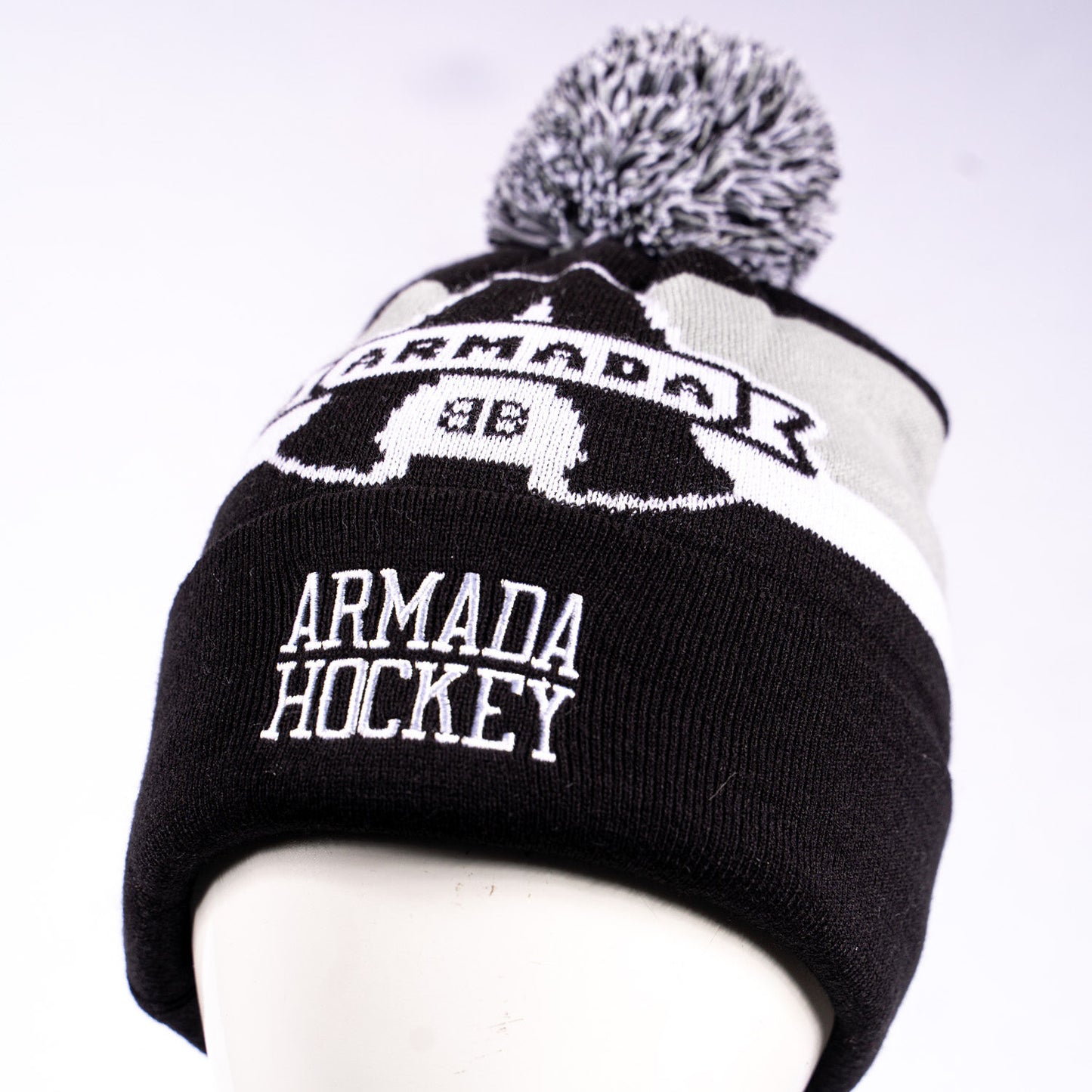 TUQUE GROS LOGO